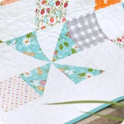 Pinwheel Surprise Quilt KitFeaturing Bountiful Blooms By Sherri & Chelsi -Quilt Muse Shop pinwheelsurprise cu2