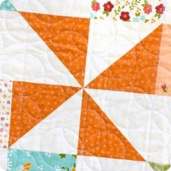 Pinwheel Surprise Quilt KitFeaturing Bountiful Blooms By Sherri & Chelsi -Quilt Muse Shop pinwheelsurprise cu6